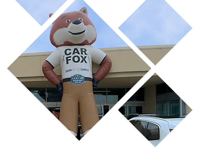 Car Fox inflatable in front of the dealership