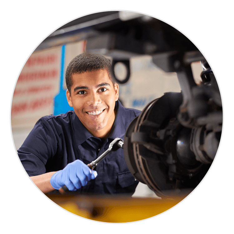 Service technician working on brakes