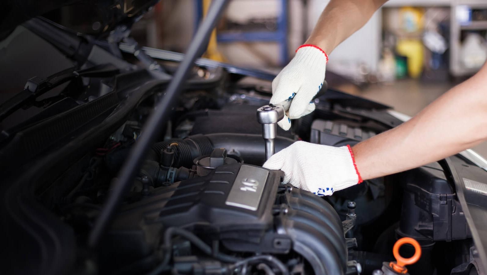 Hands of car mechanic