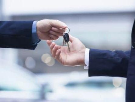 Handing over car finance key