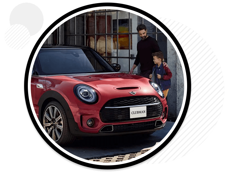 MINI vehicle parked with people standing near