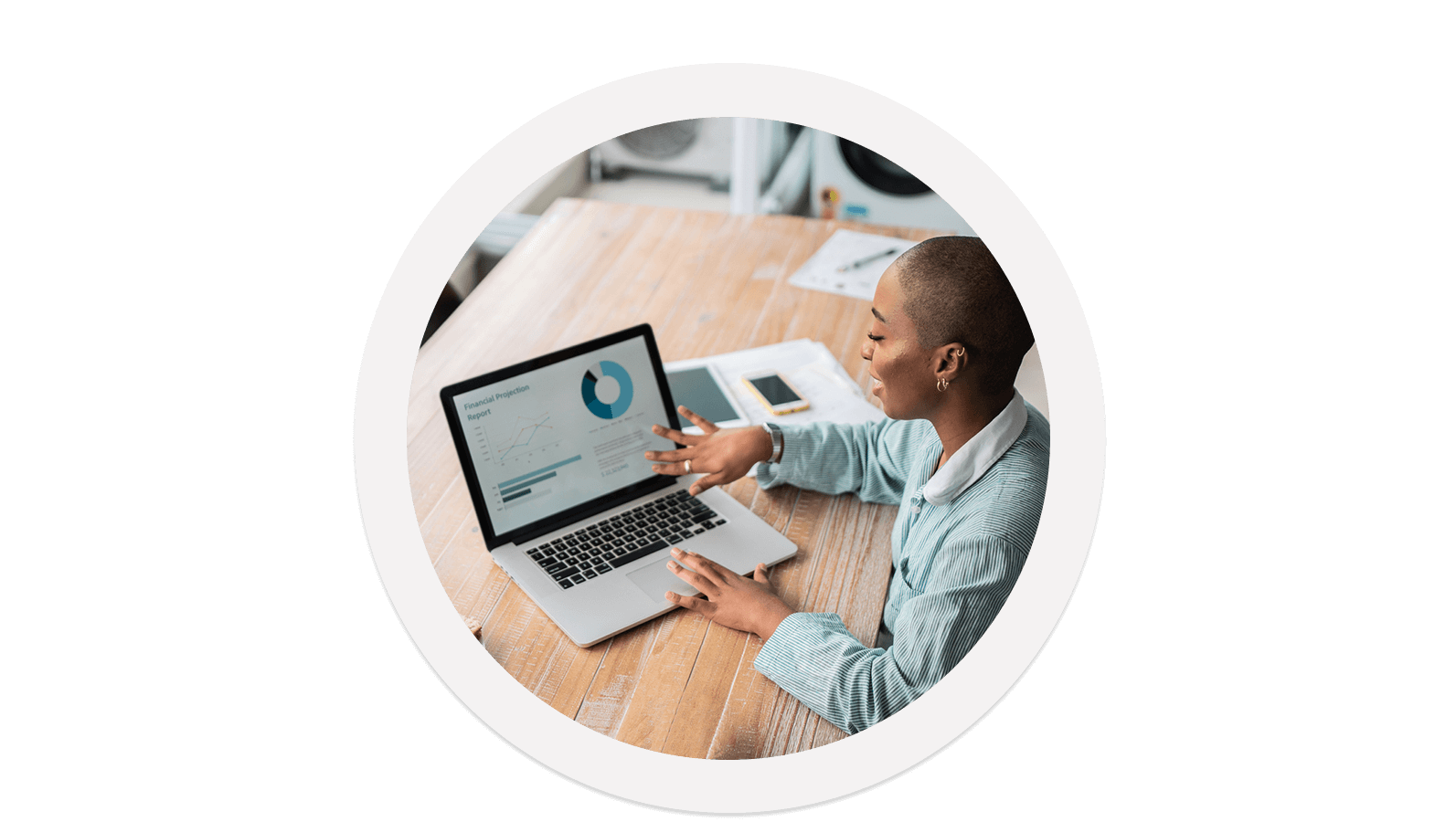 Woman looking at data dashboard on laptop