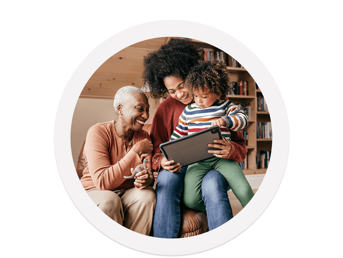 Family interacting with a tablet