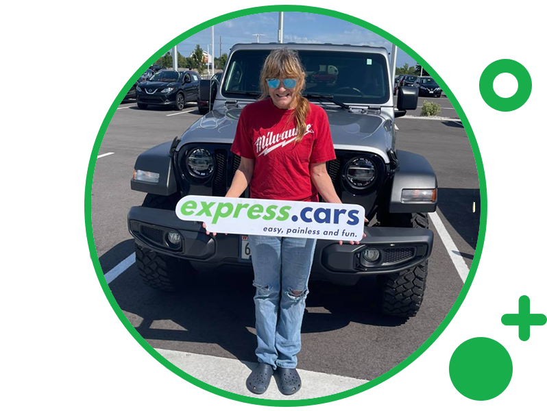 A smiling express.cars employee