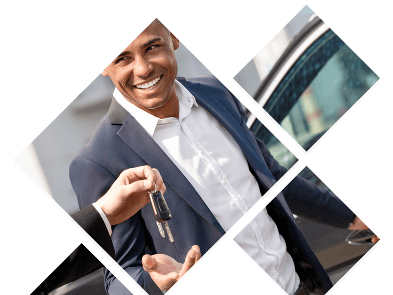 A man handing another man keys A man handing another man keys
