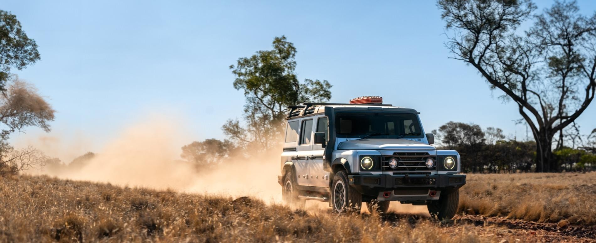 INEOS Grenadier driving through the desert.