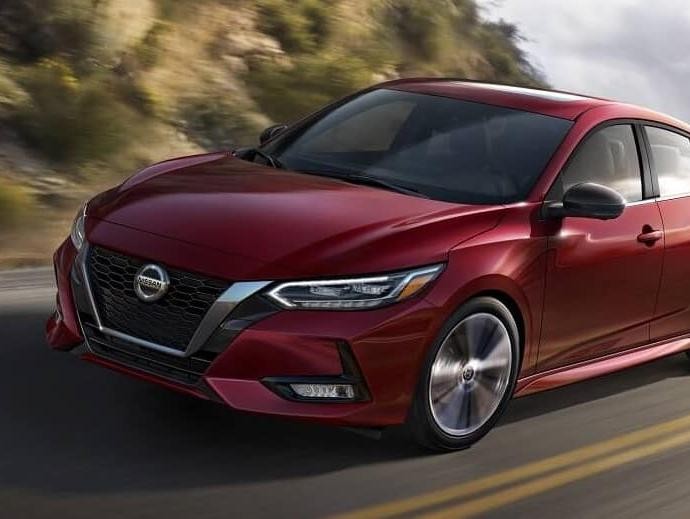 Nissan Cruising on a Turning Road