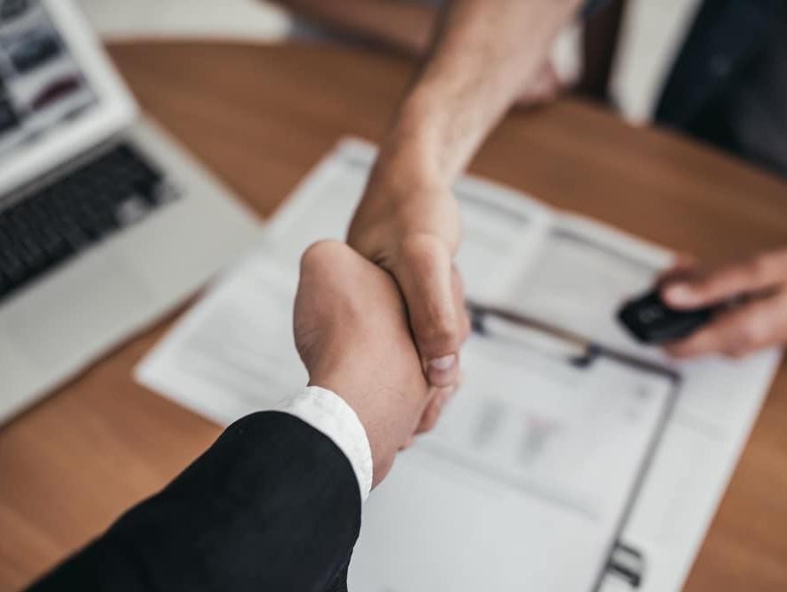 Two people shaking hands