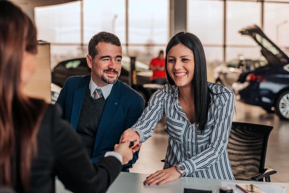 Sales  associate talking with client 