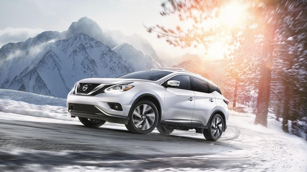 Nissan Murano driving through snow