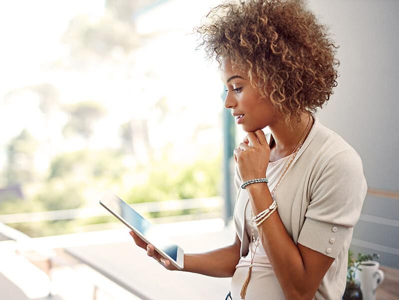 Woman shopping on tablet