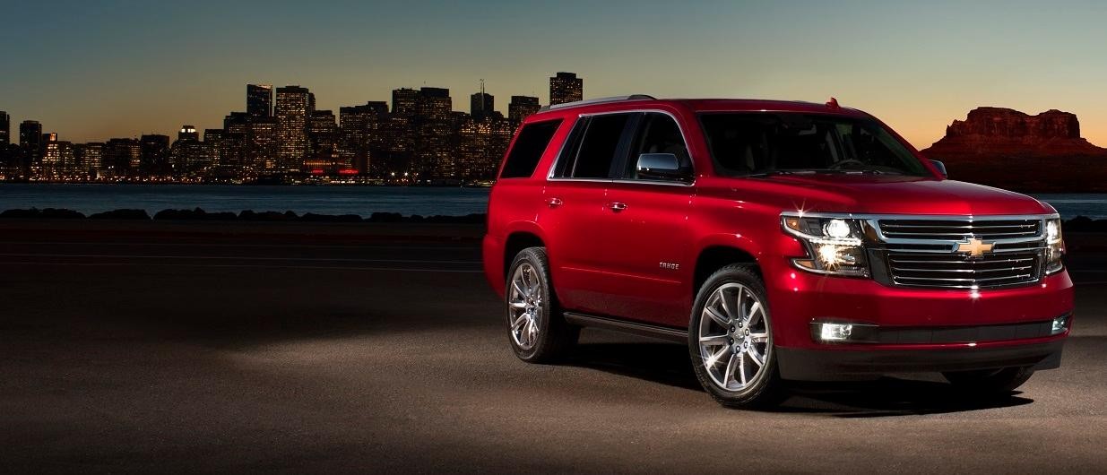 2018 Chevy Tahoe by Water with City Skyline