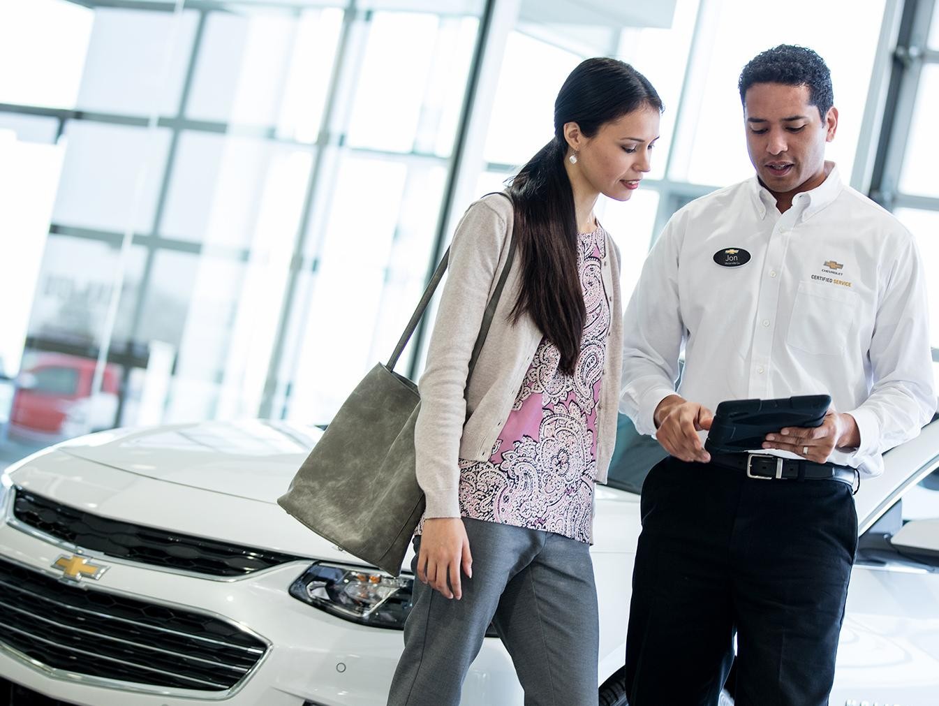 Chevrolet service representative speaking with customer