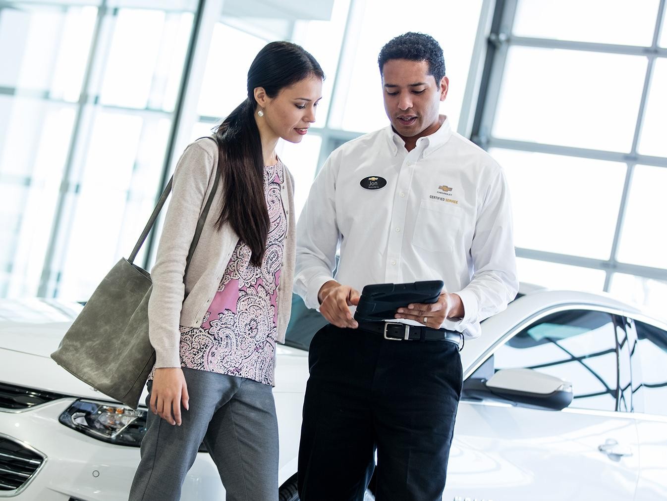 Chevrolet service representative speaking with customer